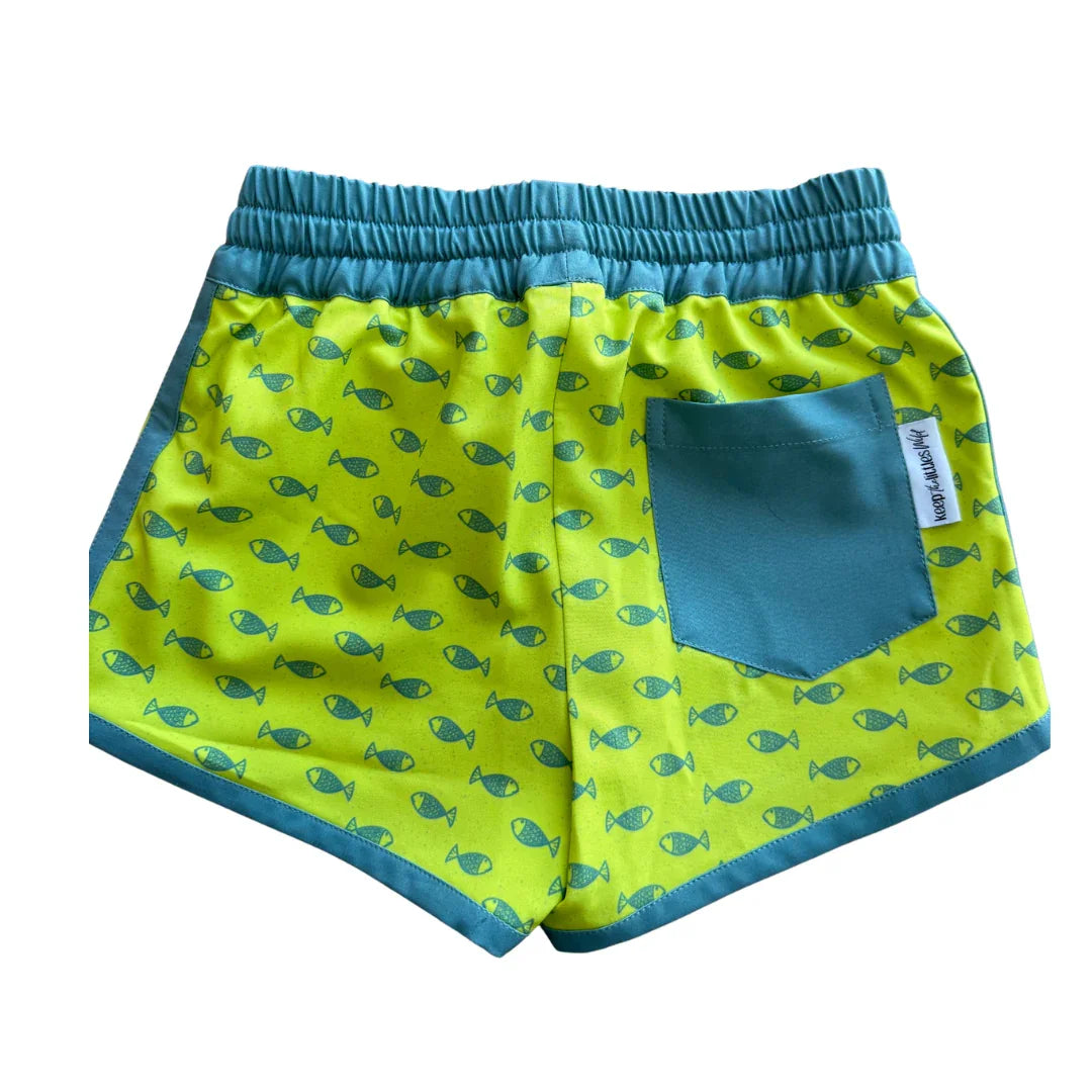 Bright green swim shorts with teal fish print and back pocket, perfect for beach days and coastal adventures.
