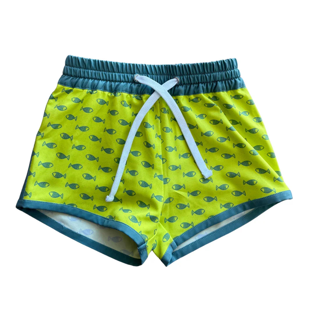 Bright yellow swim shorts with teal fish print, drawstring waist, perfect for beach days and coastal adventures.