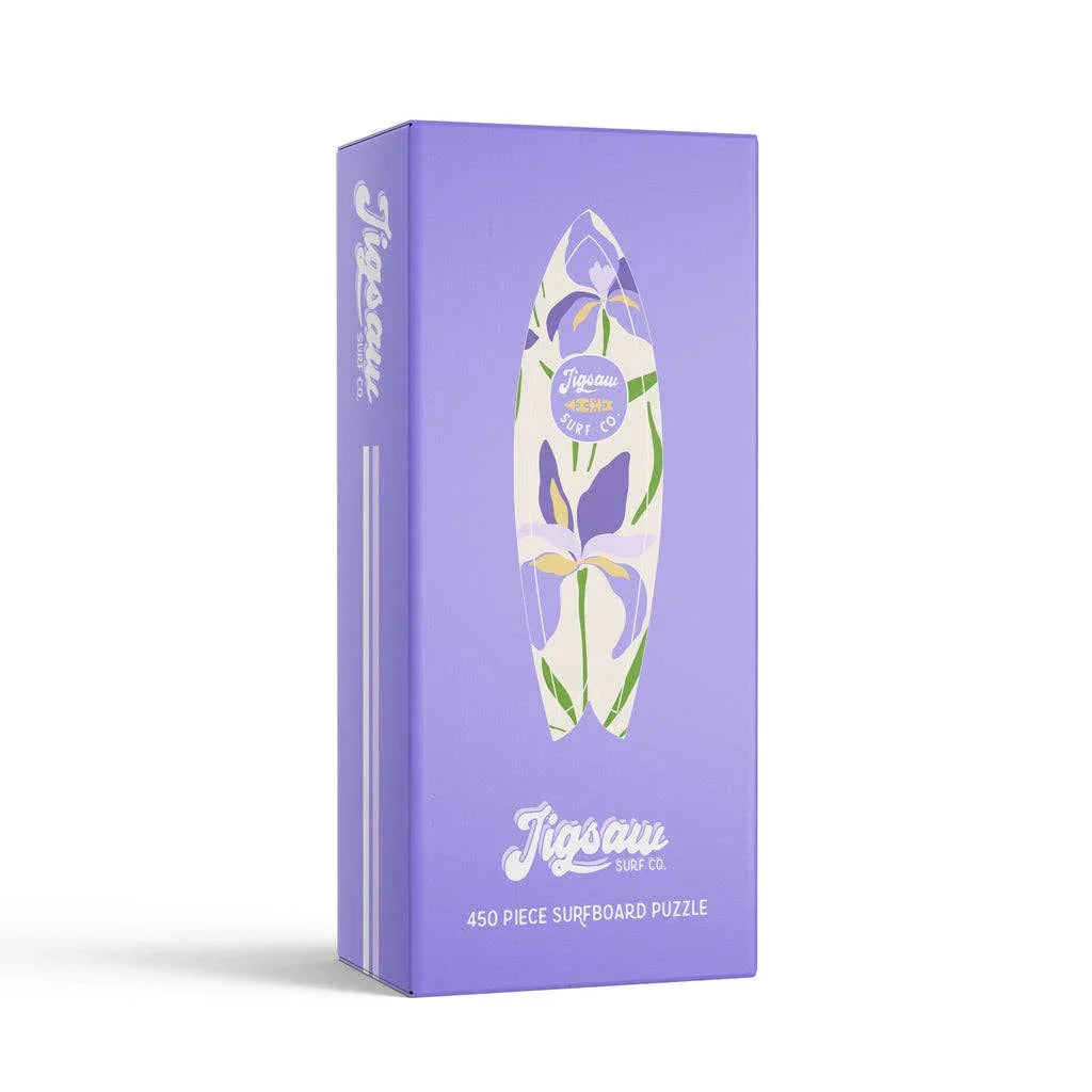 Purple 450-piece surfboard puzzle box with floral design by Jigsaw Surf Co.
