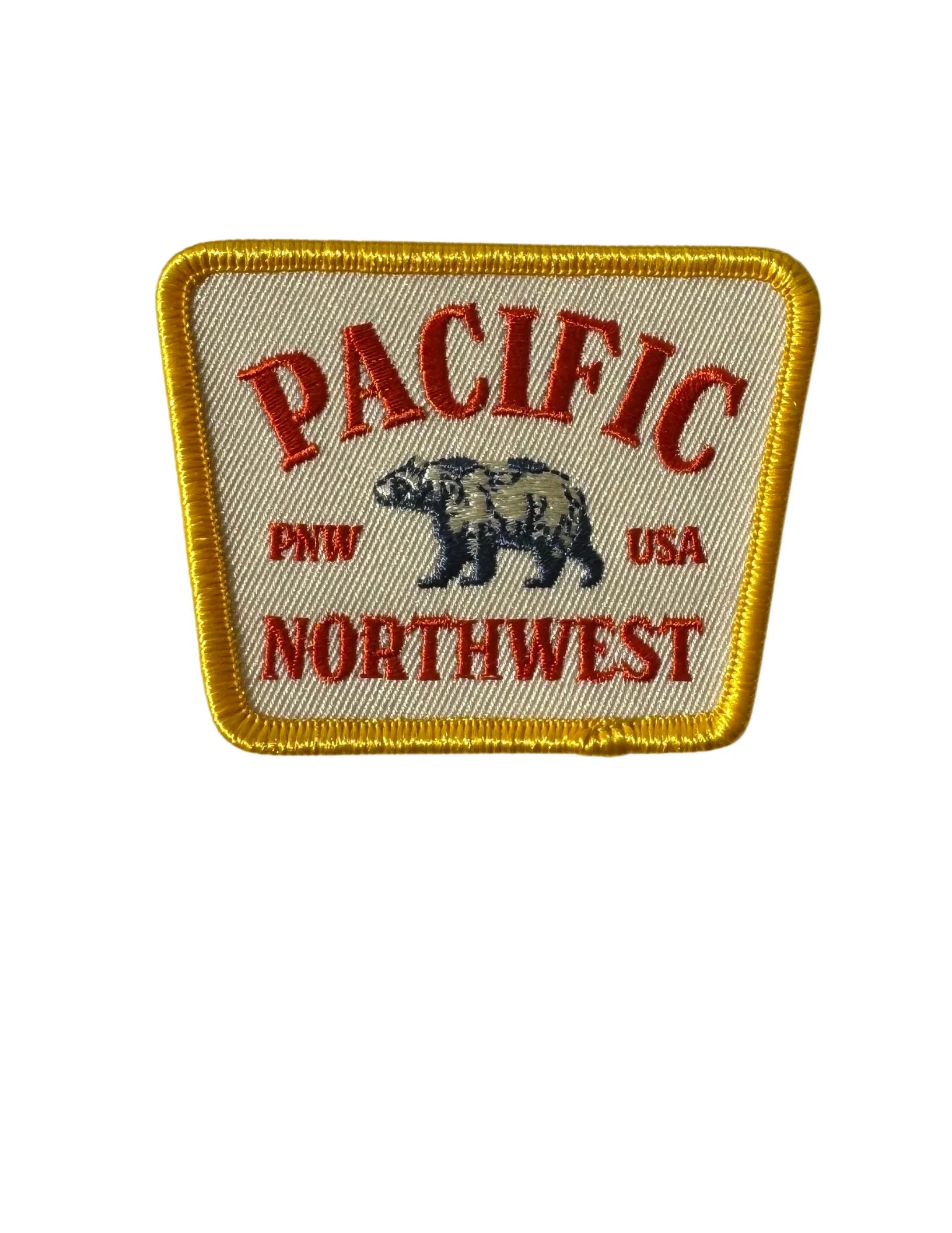 Pacific Northwest embroidered patch with bear, PNW USA, gold border, outdoor adventure gear