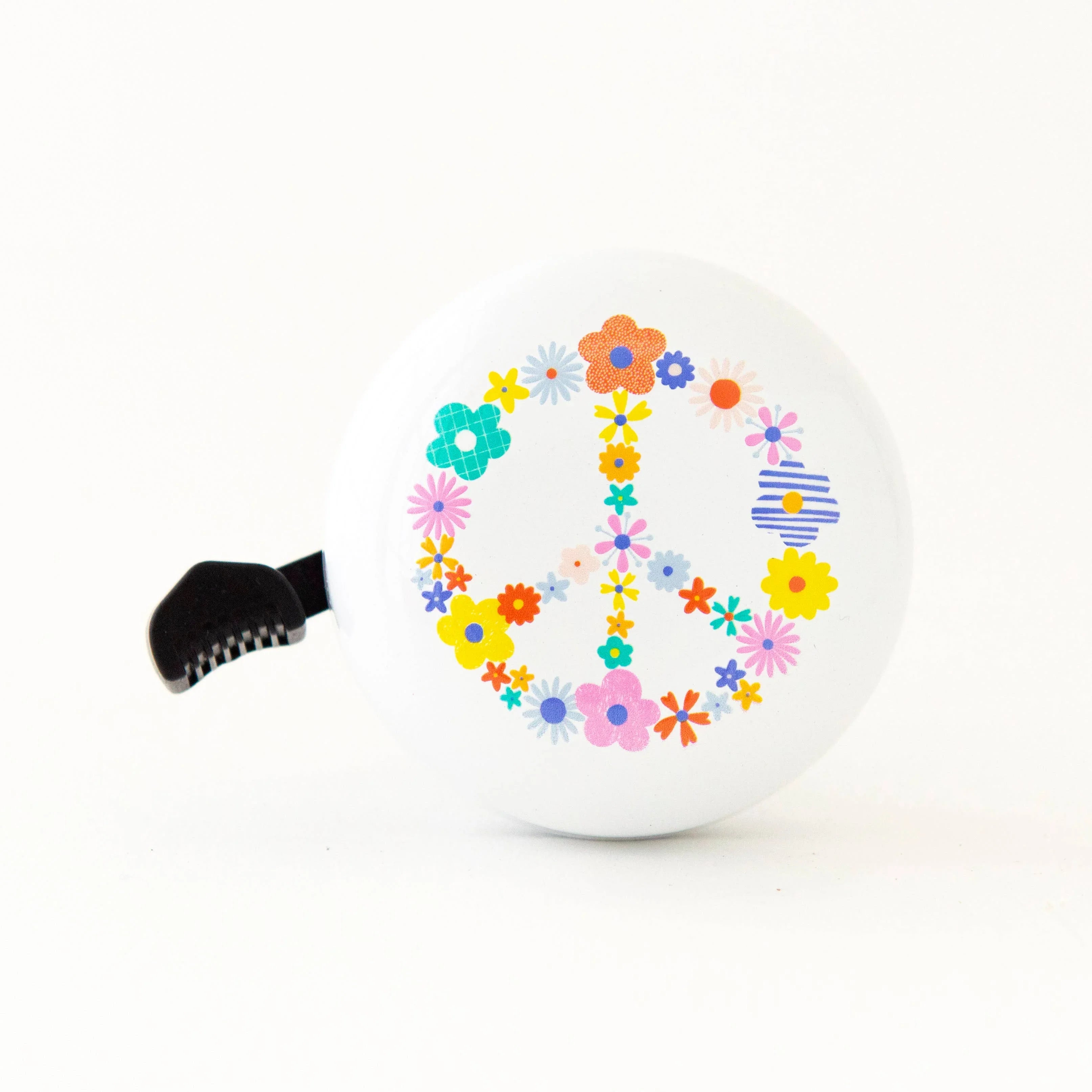White bike bell with colorful floral peace sign design, perfect for coastal bike rides and outdoor adventures.