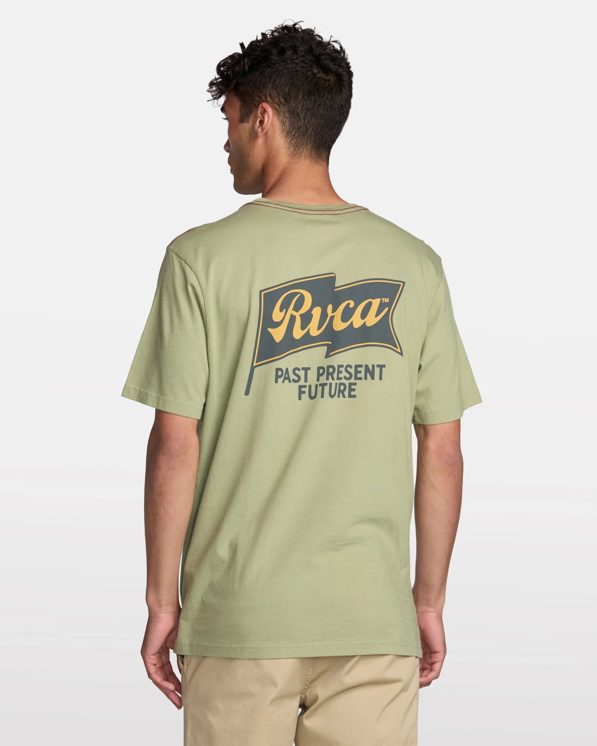 Men's olive green RVCA t-shirt with 'Past Present Future' flag graphic, ideal for coastal outdoor lifestyle.