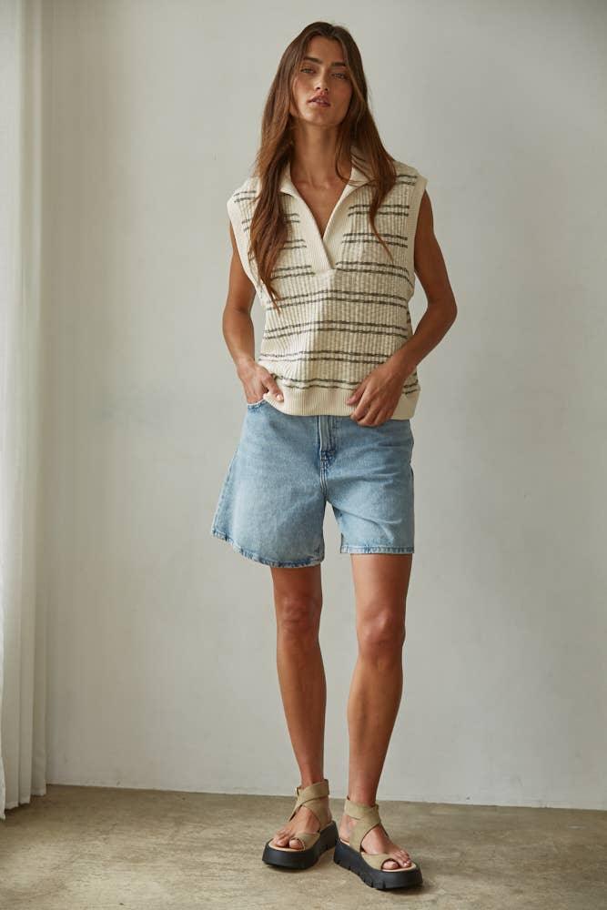 Striped sleeveless knit vest with denim shorts and platform sandals for coastal PNW style