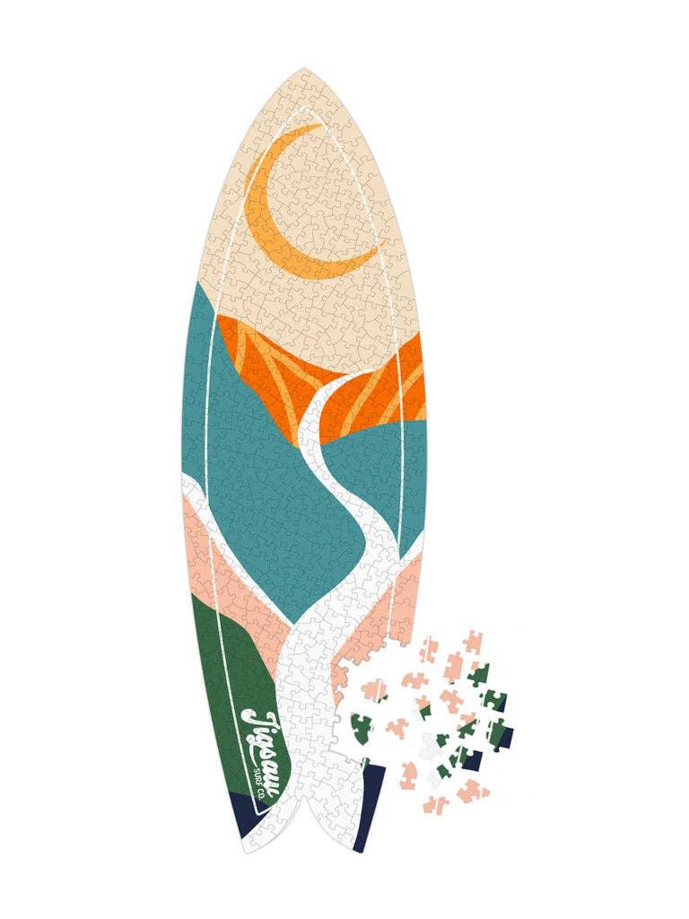 Surfboard puzzle with colorful abstract design and scattered pieces