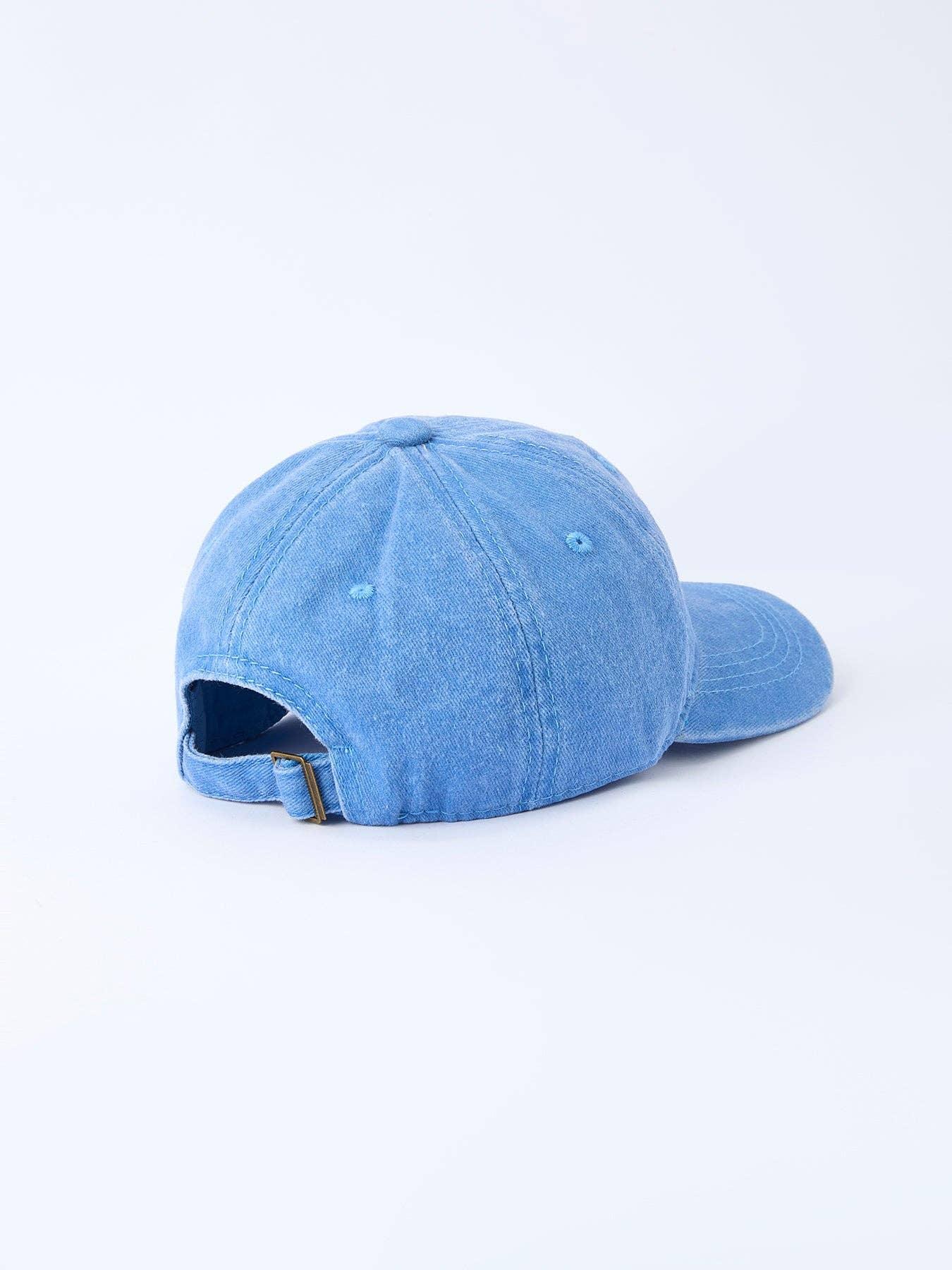 Light blue denim dad hat with adjustable strap, perfect for coastal adventures and PNW weekends.