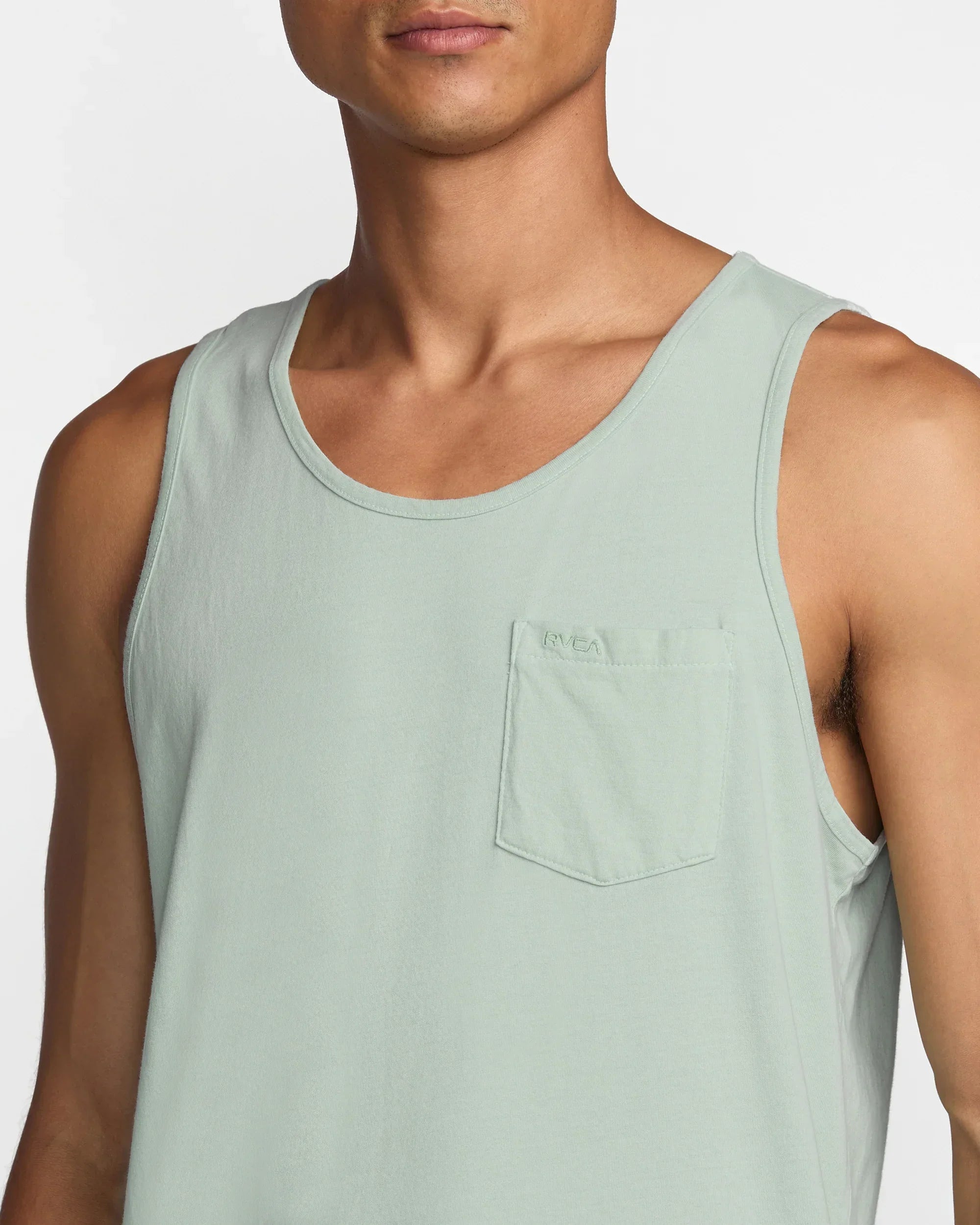 Mint green RVCA tank top with chest pocket, ideal for coastal adventures and everyday PNW style.