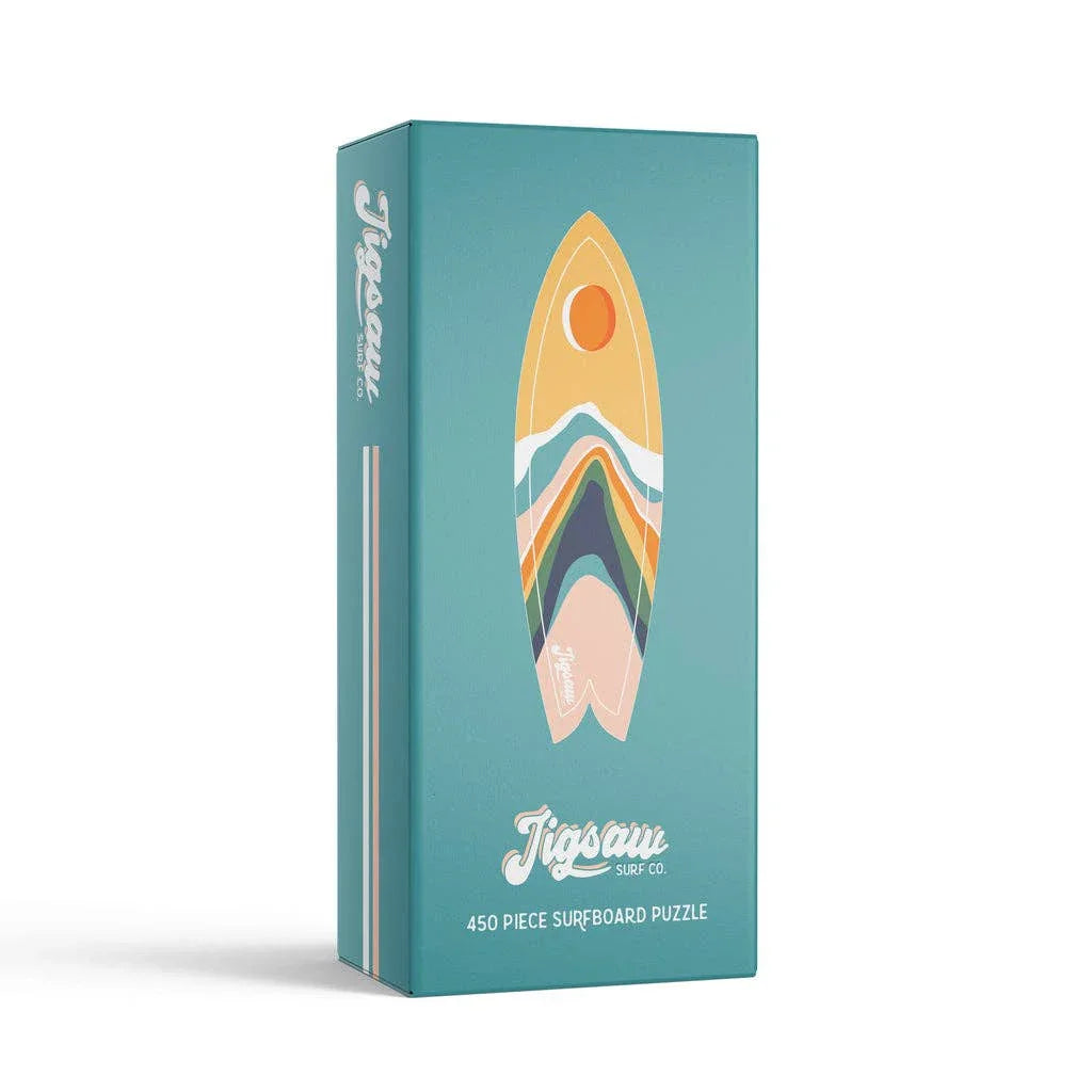 450-piece surfboard puzzle with colorful wave design in teal box