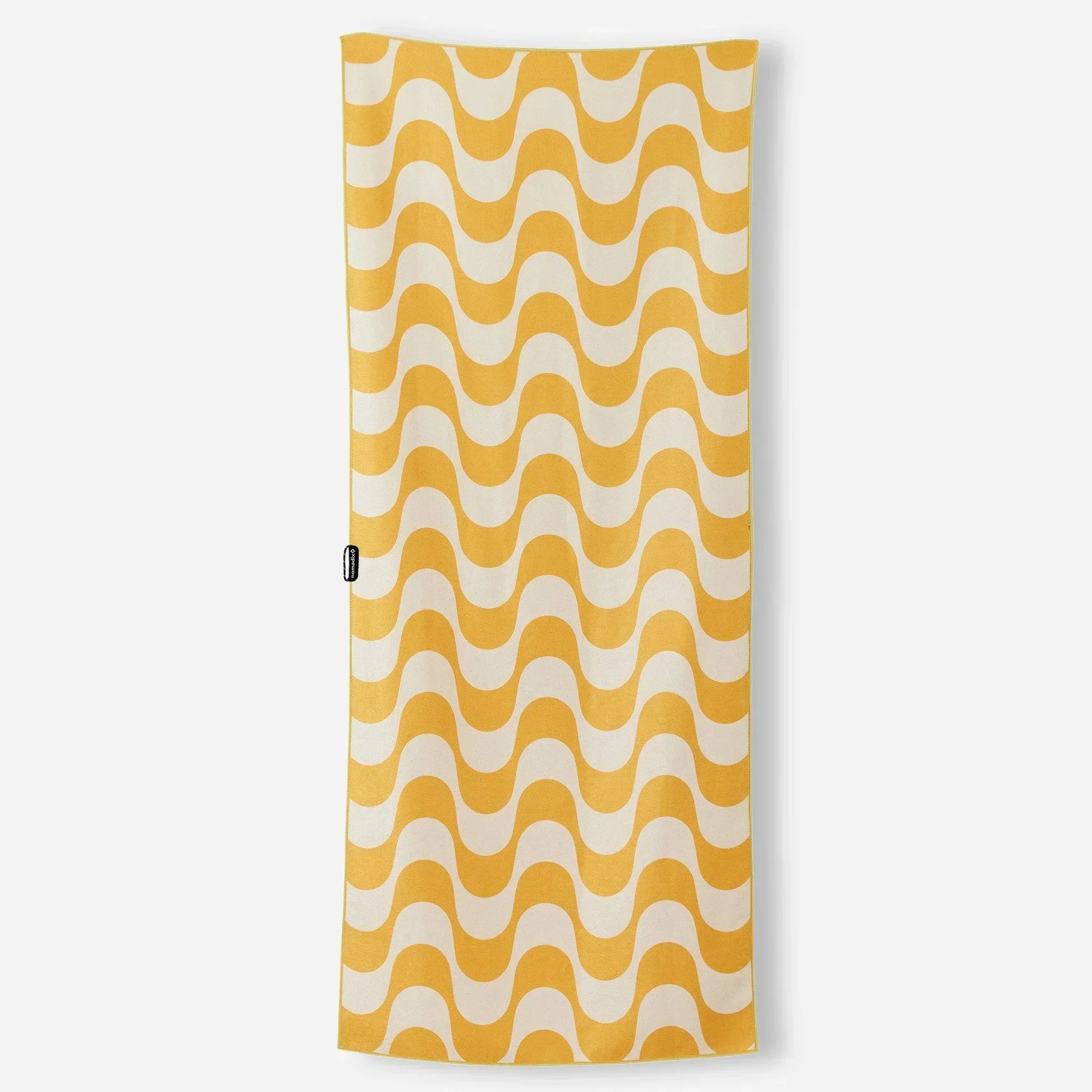 Yellow and white wavy pattern beach towel for coastal adventures and outdoor lifestyle