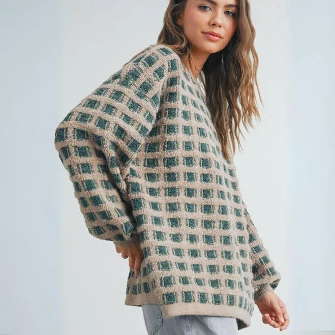Oversized plaid knit sweater in green and beige, cozy casual style
