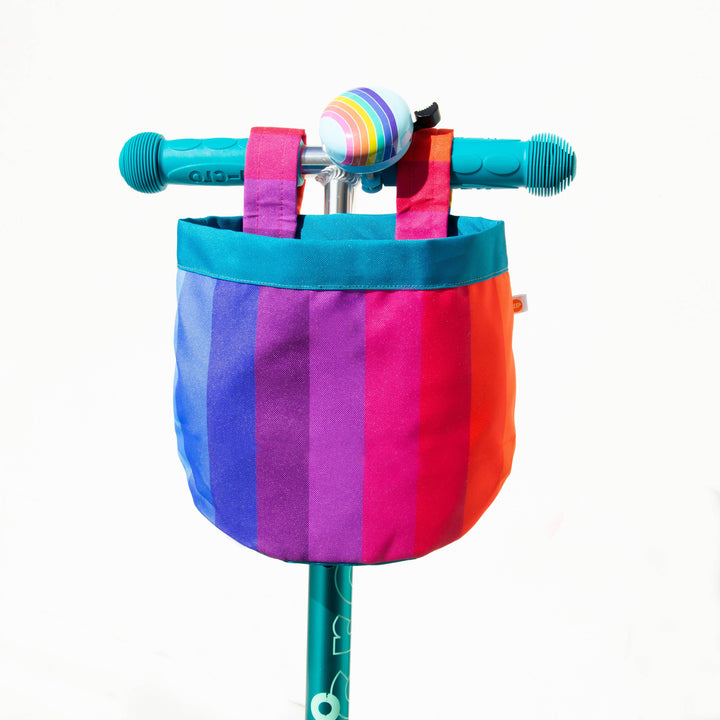 Colorful rainbow-striped bike basket with bell, perfect for kids&
