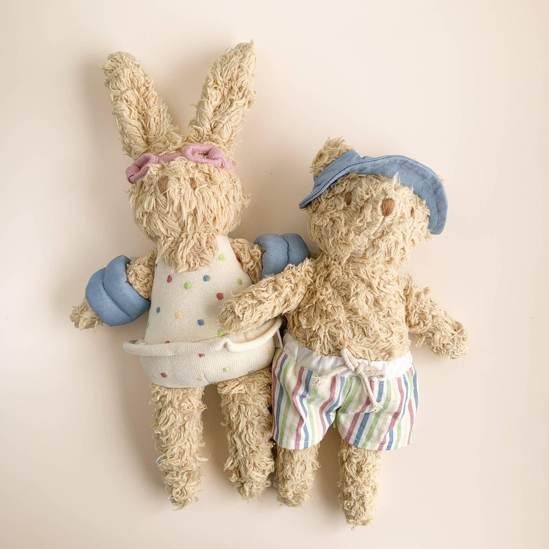 Cozy stuffed bunny and bear in beachwear, perfect for coastal kids&