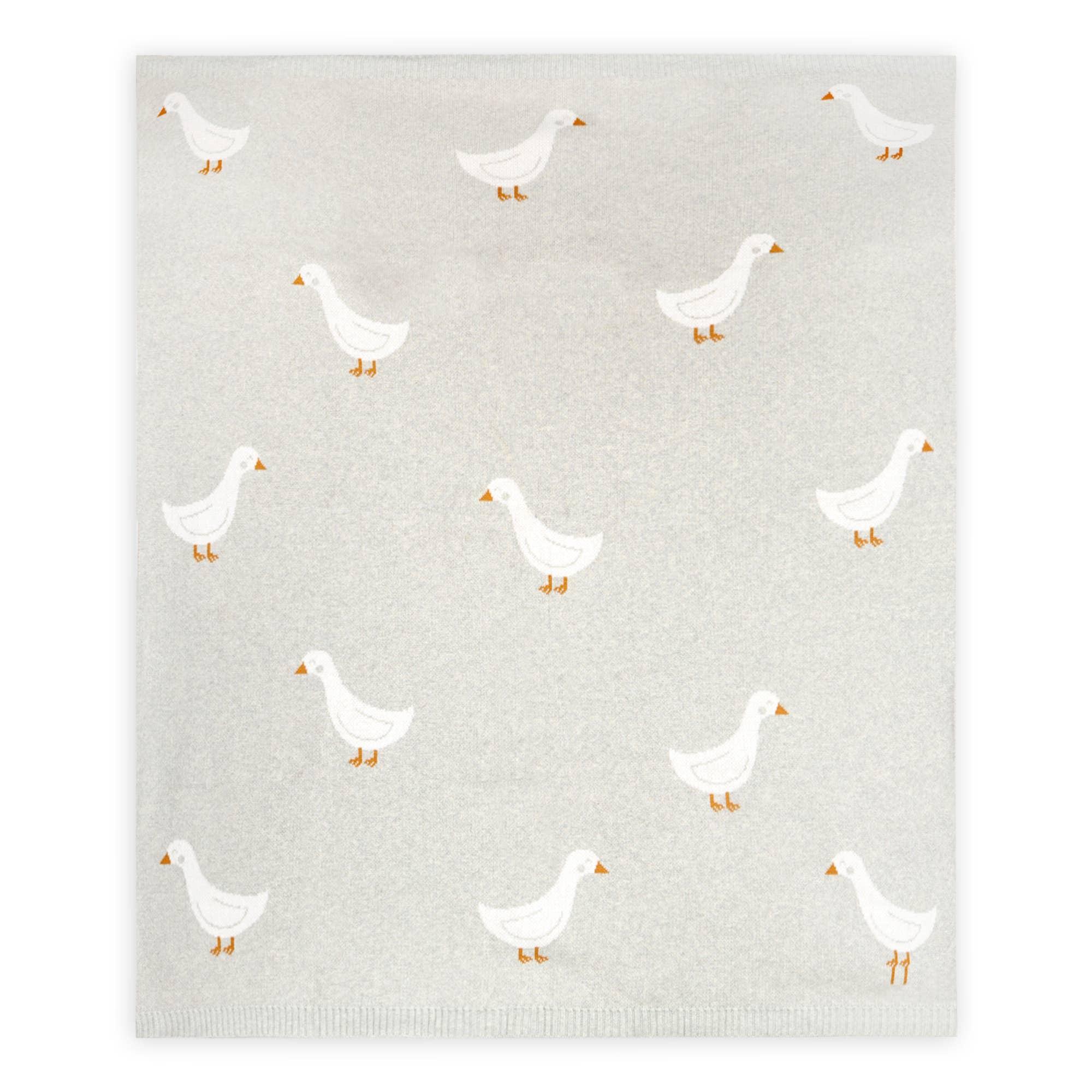 Soft gray baby blanket with white duck pattern, cozy nursery bedding