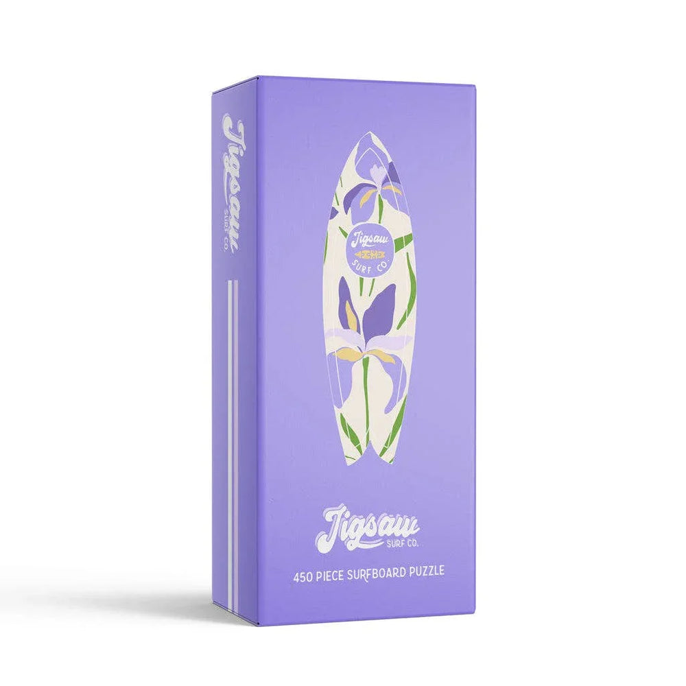 Purple 450-piece surfboard puzzle box with floral design by Jigsaw Surf Co.