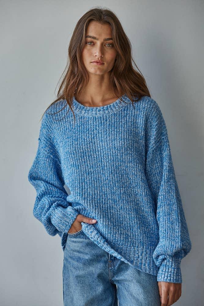 Cozy blue knit sweater with ribbed texture, perfect for PNW coastal style and everyday adventures.