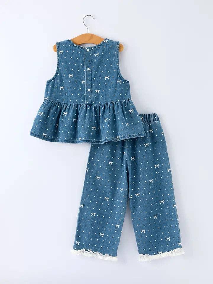Denim kids outfit with polka dots and bows, sleeveless top with ruffle hem and matching pants