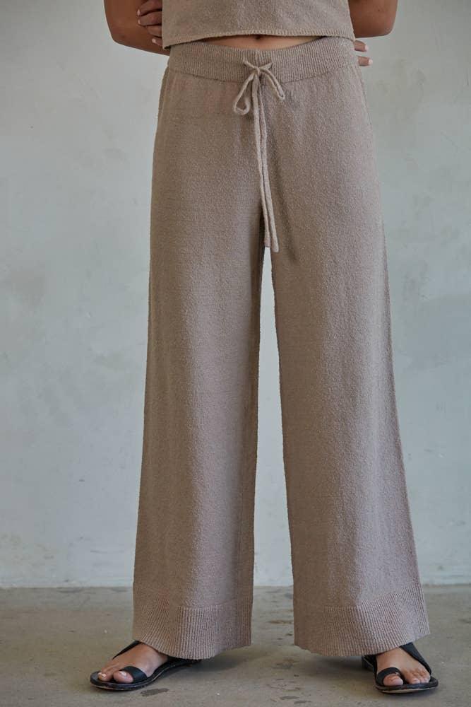 Beige wide-leg knit pants with drawstring waist, perfect for coastal PNW style and everyday comfort.