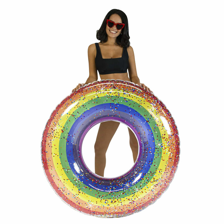 Rainbow glitter inflatable pool float with woman in swimwear and heart sunglasses