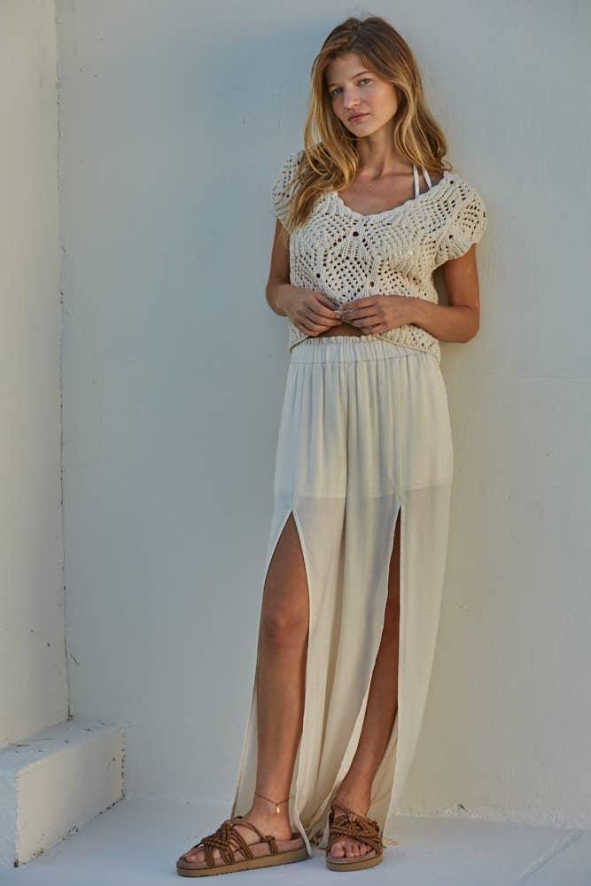 Boho crochet top with flowy slit skirt and sandals