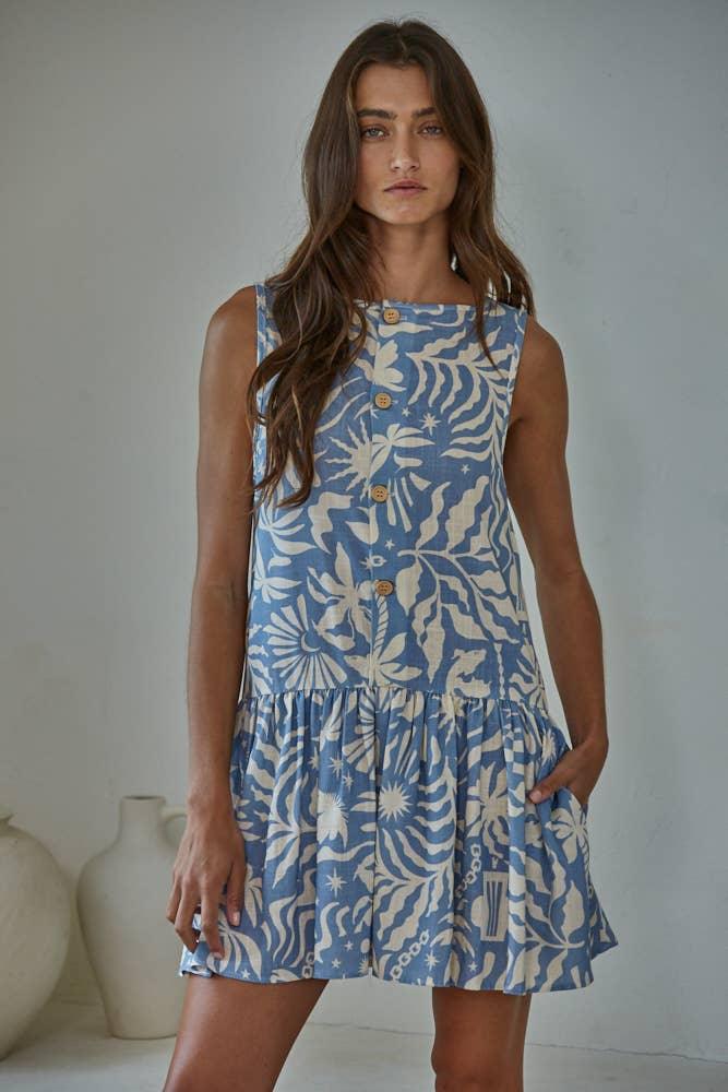 Blue floral print sleeveless dress with front buttons, perfect for coastal style and beach days