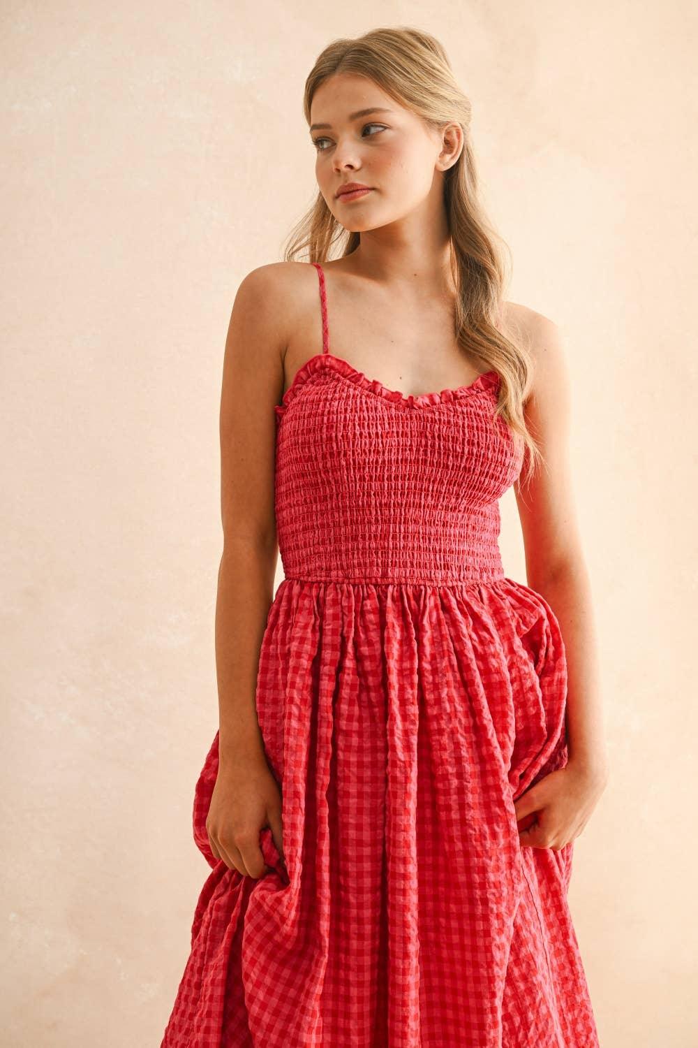 Red gingham sundress with smocked bodice and thin straps, perfect for summer outings