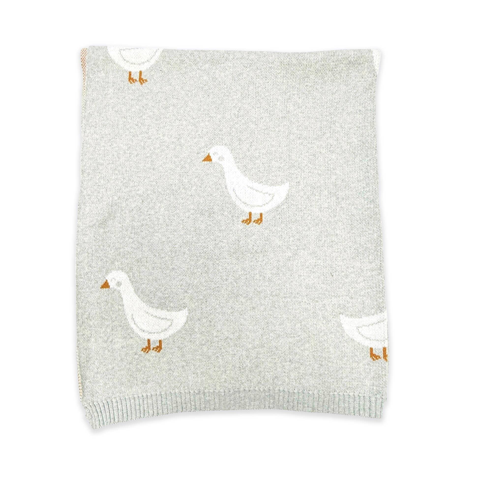 Soft gray knit blanket with white duck pattern, cozy baby nursery decor