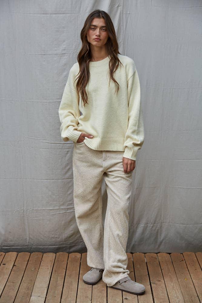 Cream oversized sweater and ribbed lounge pants for cozy coastal style