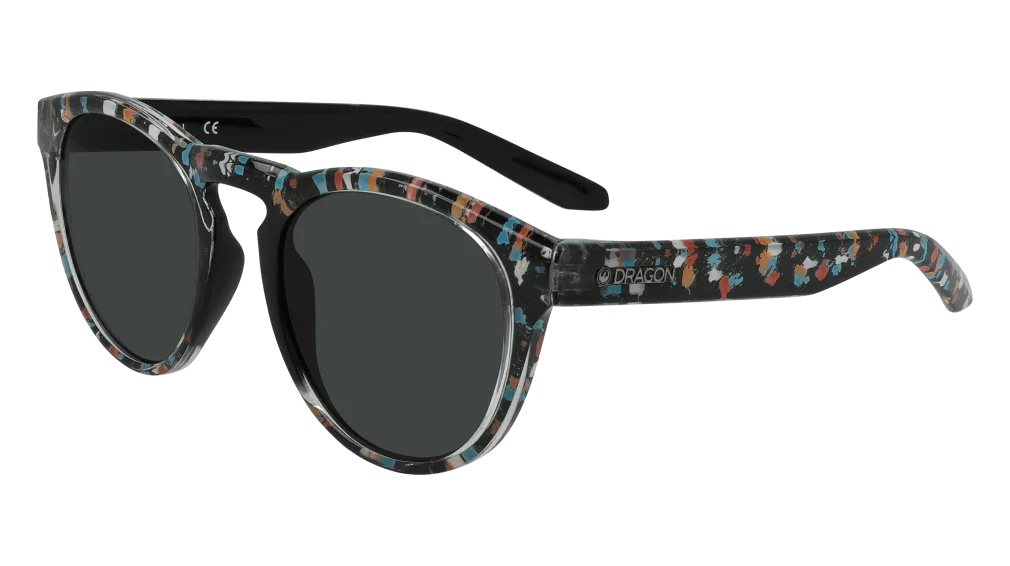 Stylish Dragon sunglasses with colorful speckled frames and dark lenses, perfect for outdoor adventures.
