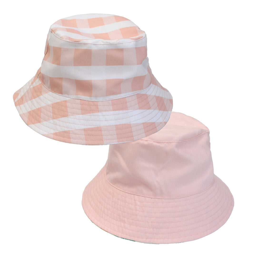 Pink gingham and solid bucket hats for beach days and outdoor adventures