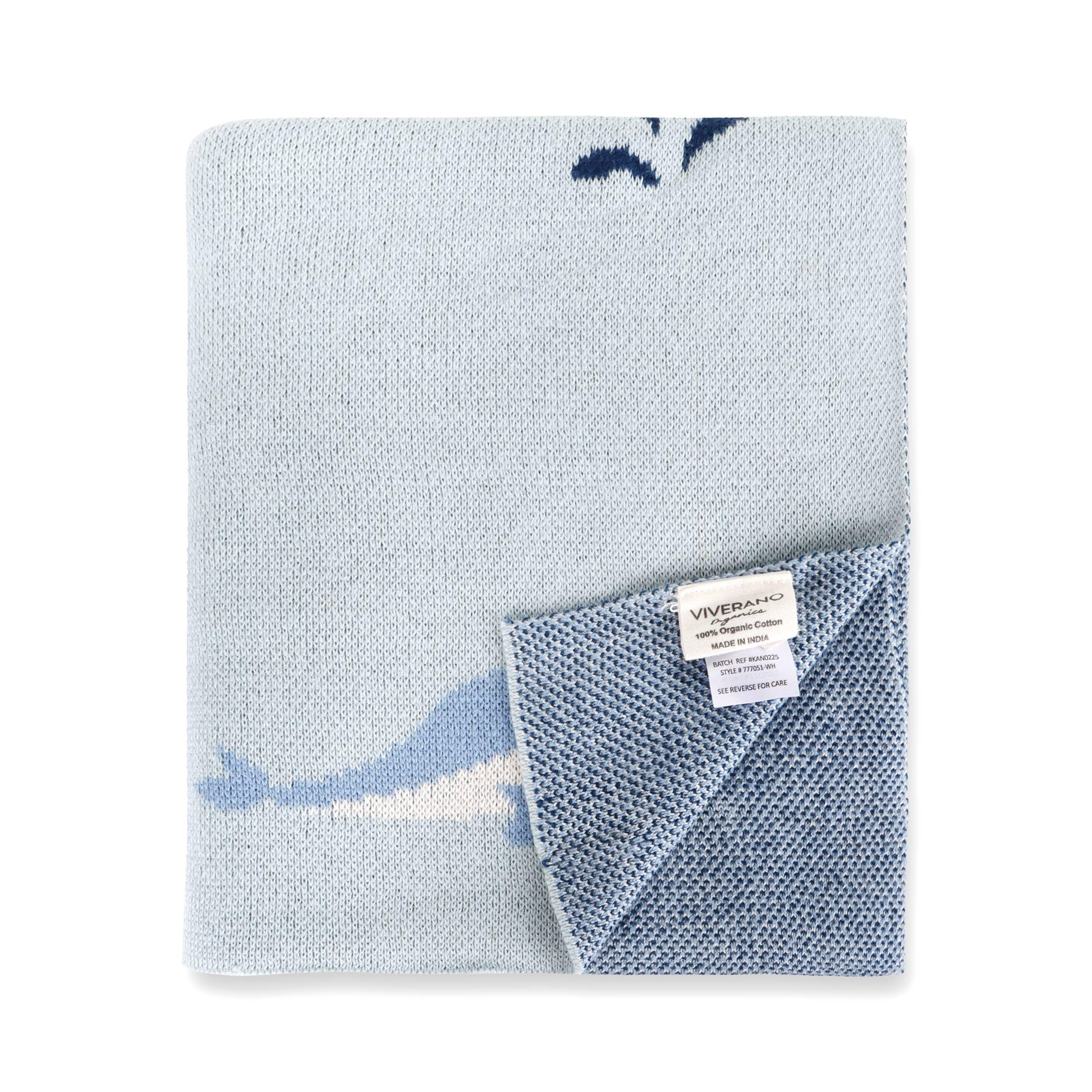 Light blue organic cotton knit blanket with whale design, soft texture, Viverano tag visible