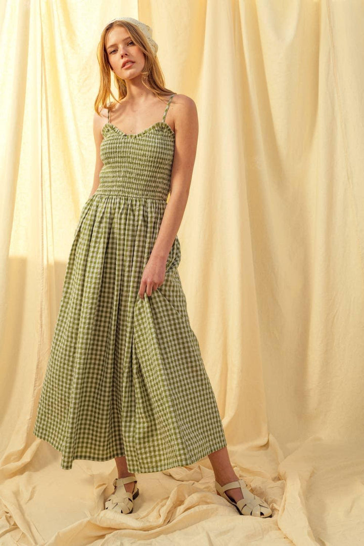 Green gingham midi dress with smocked bodice, perfect for coastal weekends and beach days