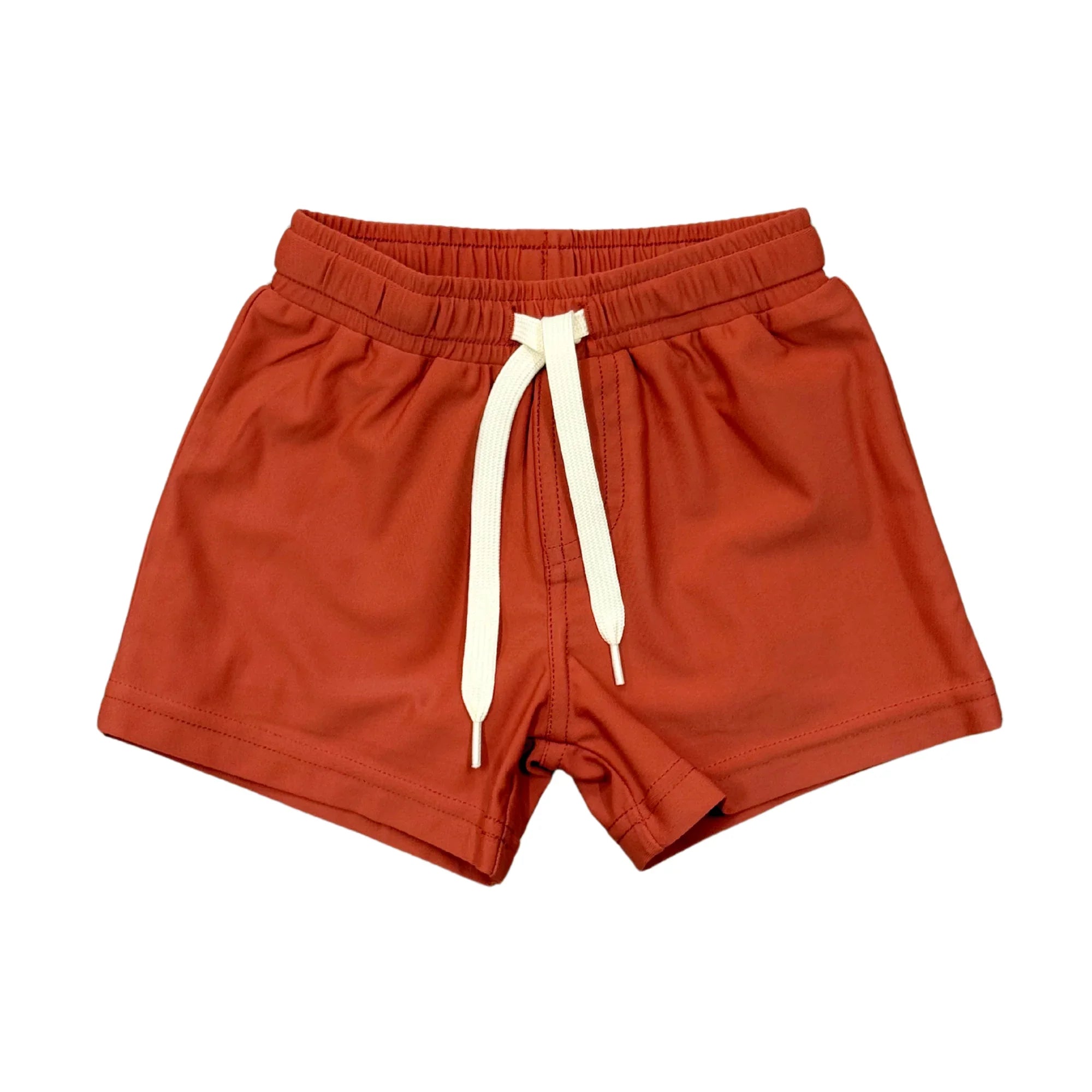 Rust-colored drawstring shorts with elastic waist, perfect for beach days and coastal adventures.