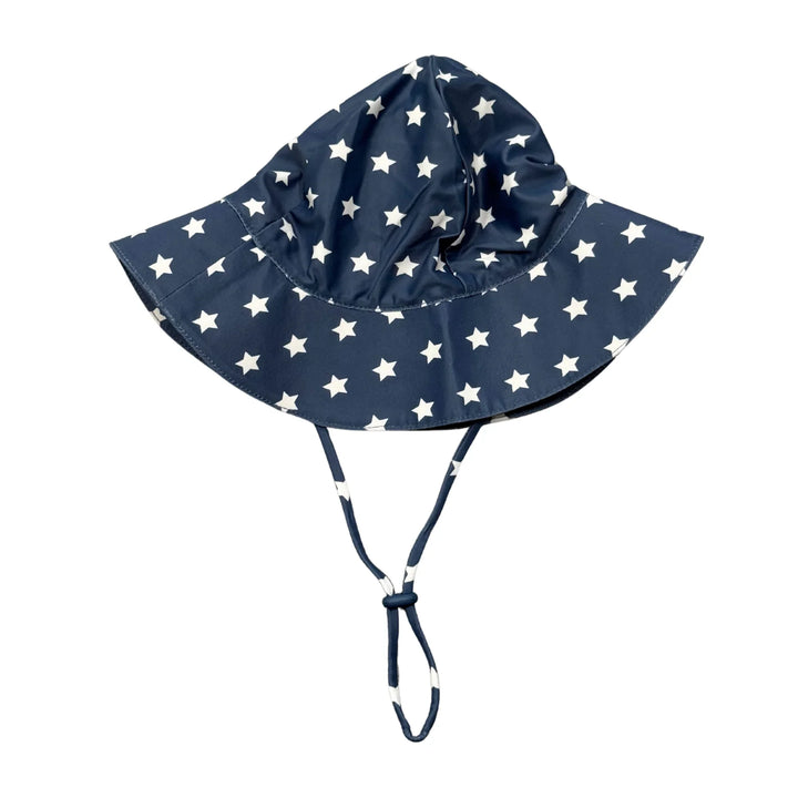 Navy blue kids sun hat with white stars, wide brim, and chin strap for beach or outdoor adventures