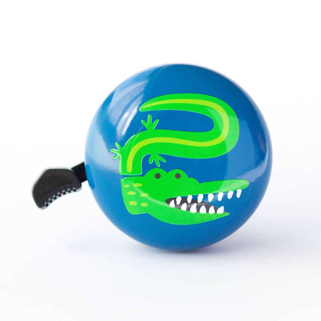 Blue bike bell with green alligator design, perfect for kids' outdoor adventures and bike rides.