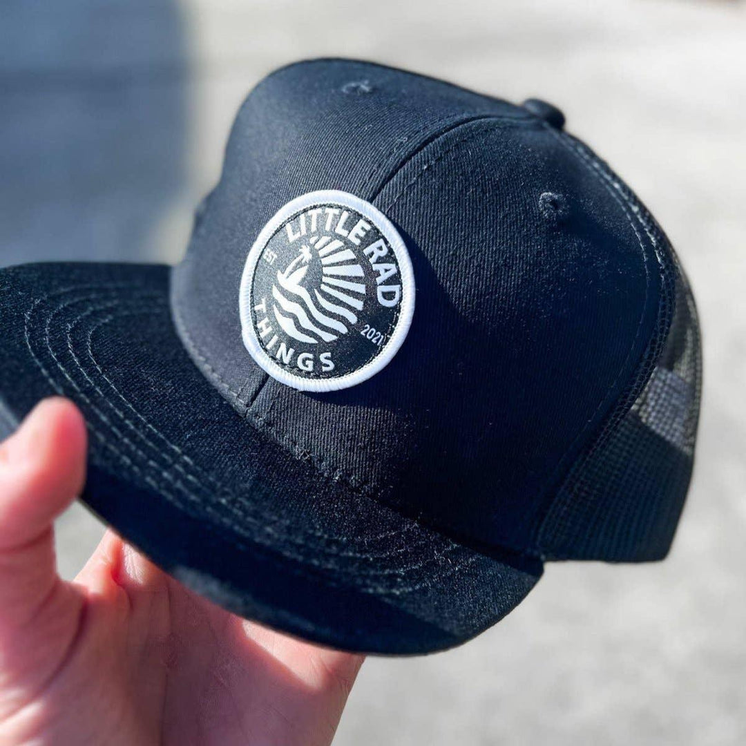 Black trucker hat with &