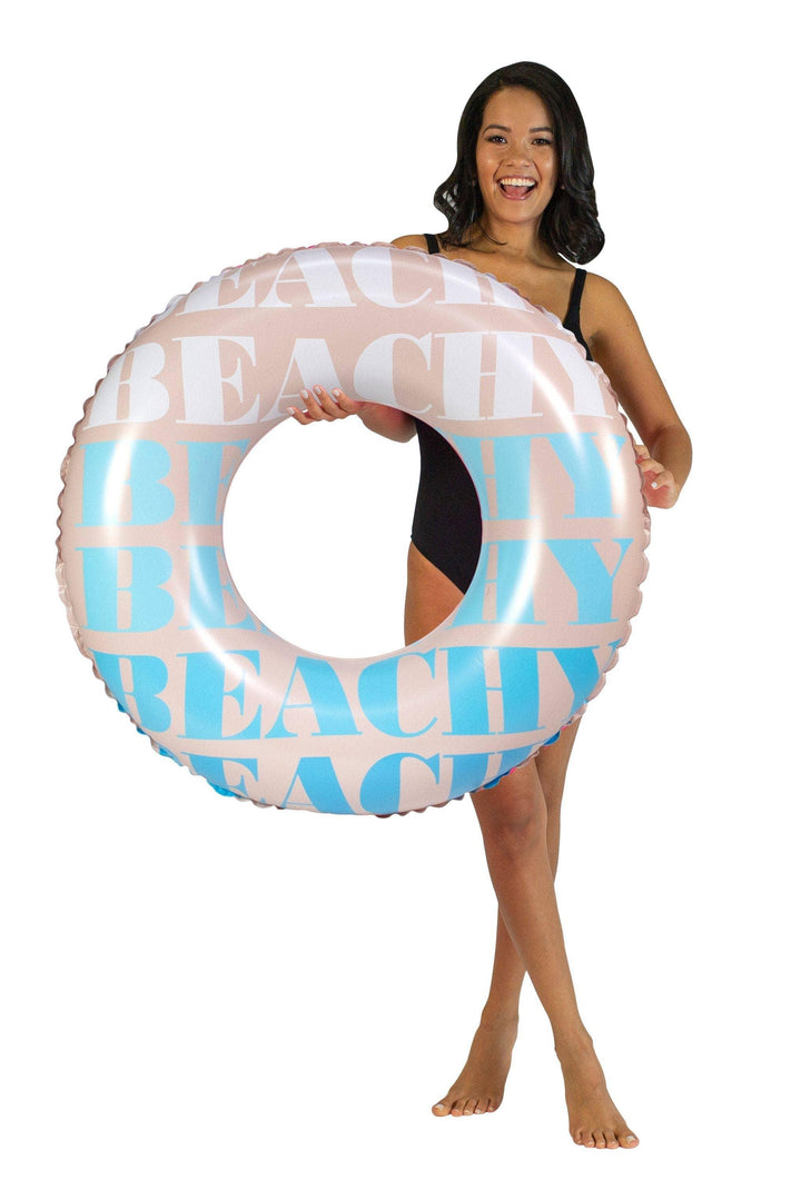 Woman holding pink and blue &