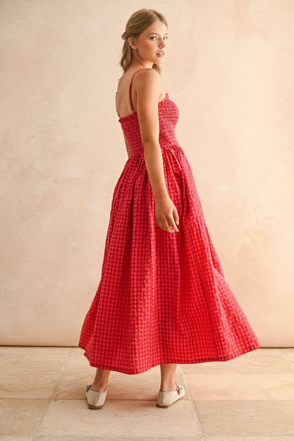 Red gingham midi dress with smocked bodice and spaghetti straps