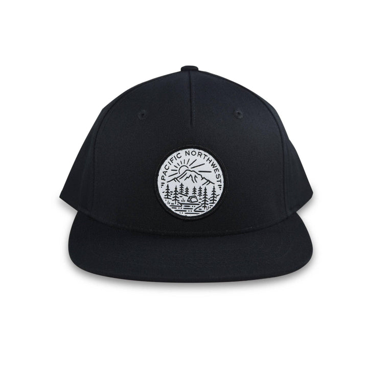 Black snapback hat with Pacific Northwest mountain and forest patch, ideal for PNW outdoor adventures.