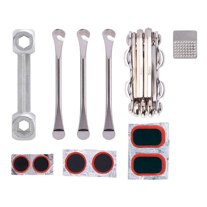 Bike repair kit with tire levers, multi-tool, patch kit, and wrench for trailside fixes