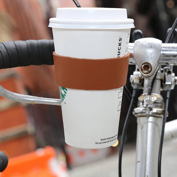 Bike handlebar with coffee cup holder, perfect for coastal rides and outdoor adventures