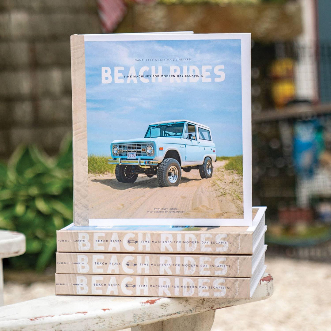 Beach Rides book stack featuring vintage truck on sandy coast, perfect for modern escapist adventures