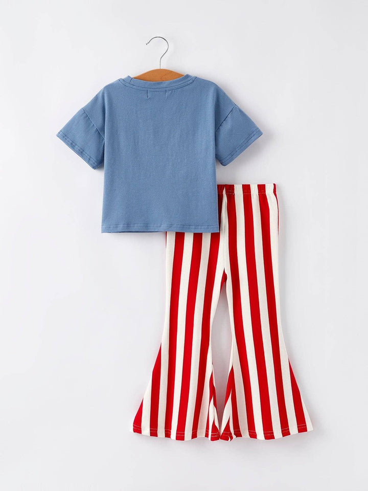 Blue kids tee with red and white striped flare pants, casual coastal outfit