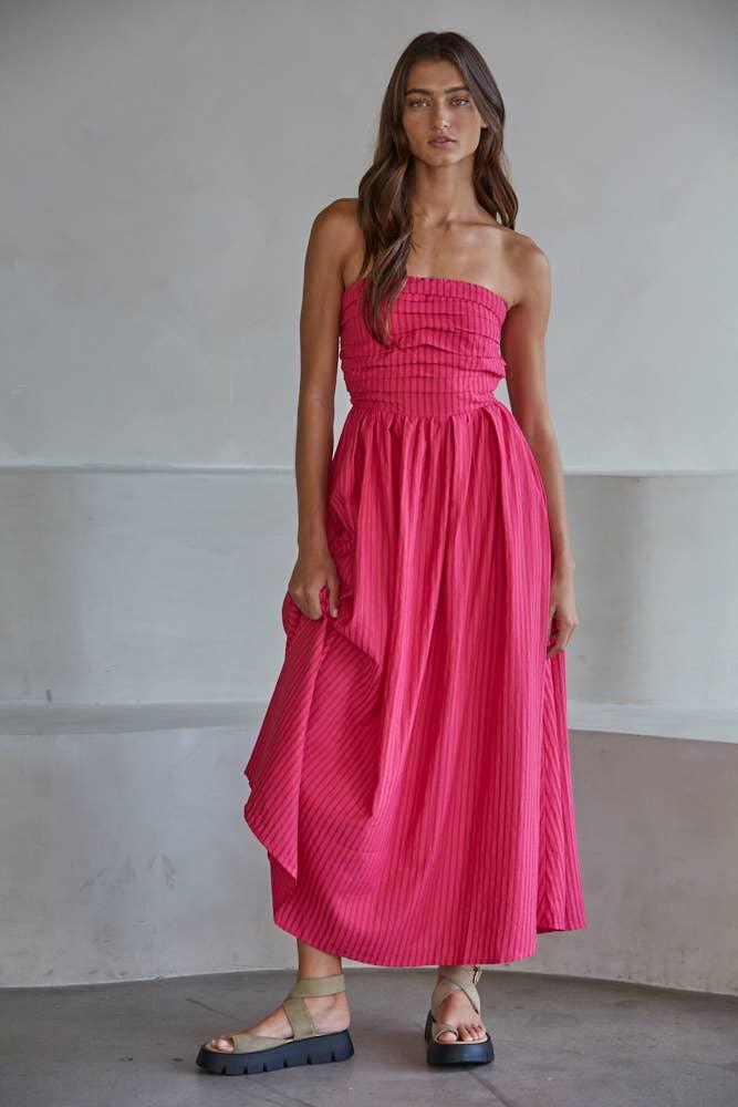 Strapless pink pleated maxi dress with platform sandals for coastal style