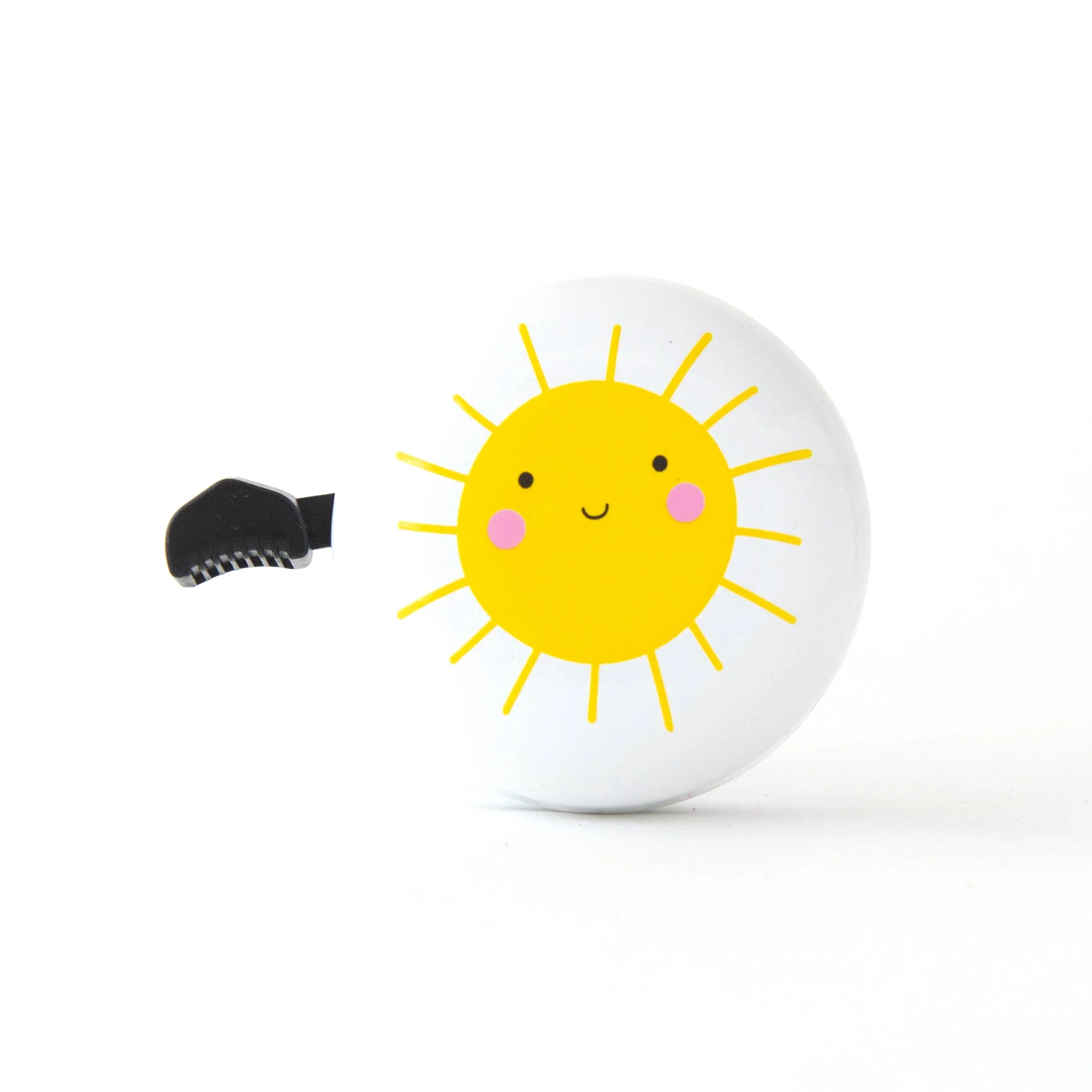 Cute sun-themed bike bell with cheerful yellow face and pink cheeks, perfect for coastal adventures.
