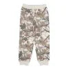 Camouflage jogger pants for outdoor adventures, perfect for PNW coastal style and trail days.