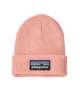 Soft pink beanie with colorful mountain logo, perfect for PNW outdoor adventures and coastal style.
