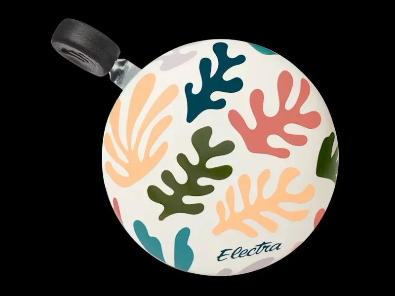 Trek Coral Reef Bell with colorful coral patterns on a white background
