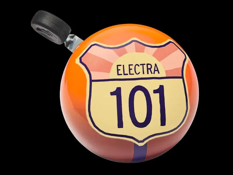 Orange Electra 101 bike bell with retro highway shield design, perfect for coastal rides and PNW adventures.