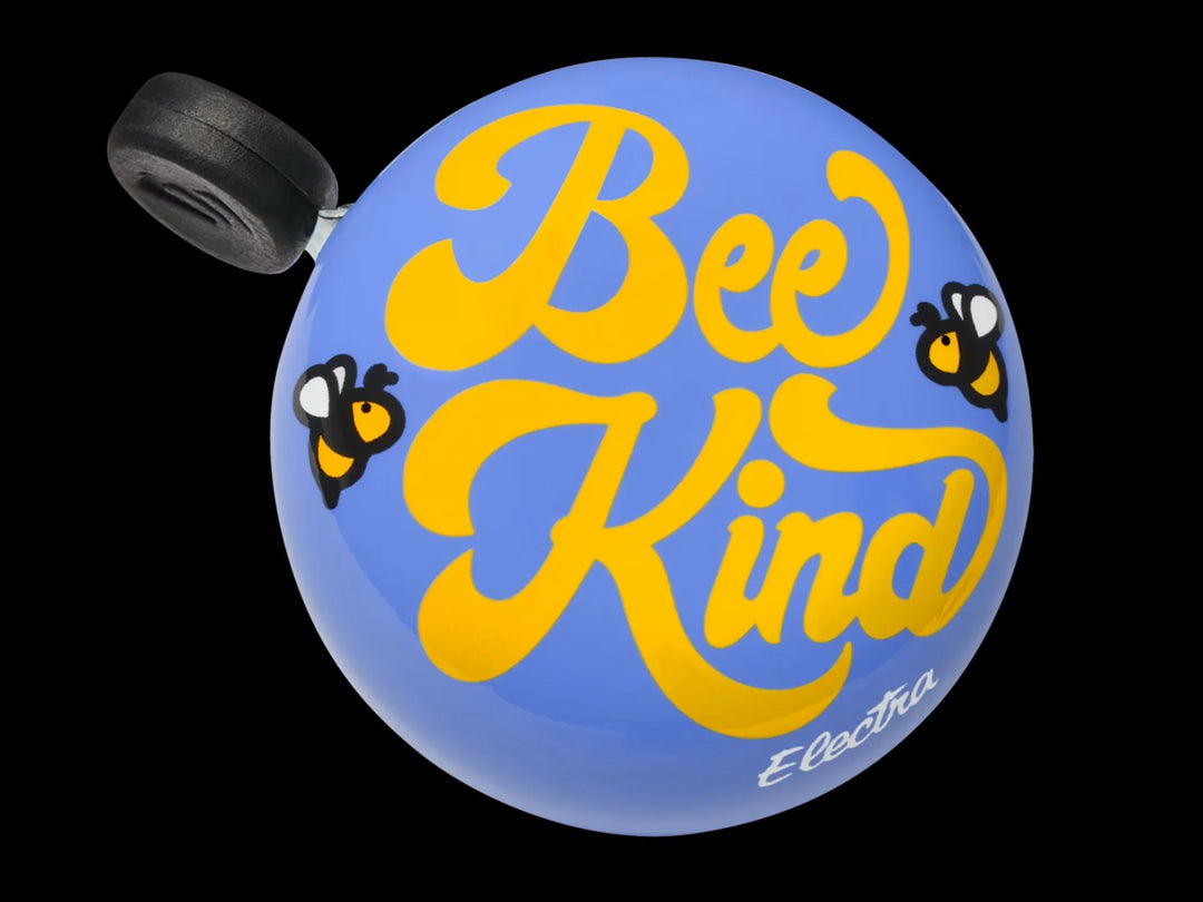Blue bike bell with 'Bee Kind' in yellow script and cute bees, perfect for coastal rides and outdoor adventures.