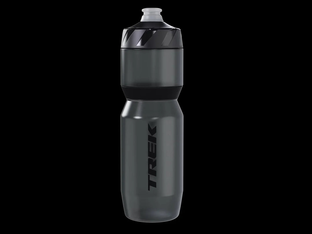 Trek branded gray bike water bottle with black accents, ideal for cycling adventures and outdoor activities