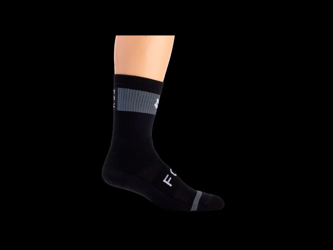 Black performance crew sock with gray stripe and white logo, ideal for biking and outdoor adventures